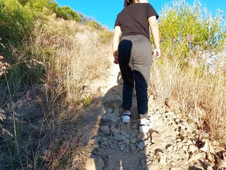 Big ass Latina showing ass and tits in the mountain