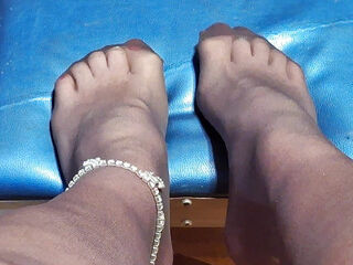 Can I give a nylon covered foot job?