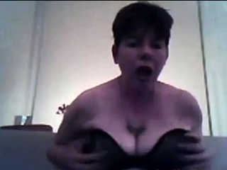 Busty mature brunette shows off her big natural saggy tits o