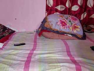 Bangladeshi woman cleaning the house alone