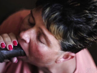 DRIPDROP: Short haired GILF sucks with cum dripping off her face!!