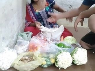 'Indian woman selling vegetable romp other people'