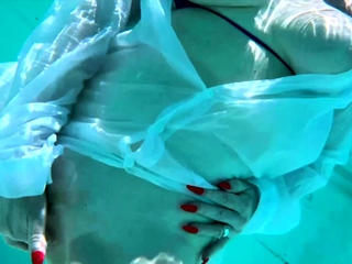 Red XXX feeling horny outside by the pool