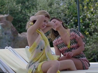 Nude lesbian MILF and teen GF sunbathing