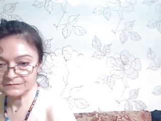 Mature with glasses on web-cam