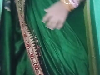 Indian queer Crossdresser Gaurisissy in Green Saree Pressing Her hefty bumpers and finger-banging in Her culo